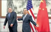  ?? REUTERS ?? Chinese state councilor and foreign minister Wang Yi (right) with US secretary of state Mike Pompeo in Beijing on Monday.