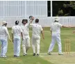  ?? Photo: Kevin Farmer ?? Wests celebrate another wicket against Mets.