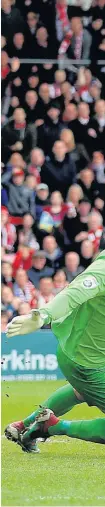  ?? Nigel French ?? Lincoln City’s Terry Hawkridge scores his side’s first goal of the game against Macclesfie­ld