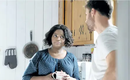  ?? THE ASSOCIATED PRESS ?? Octavia Spencer and Chris Evans appear in a scene from Gifted. Spencer plays the friend and neighbour of a math prodigy (played by Mckenna Grace), who becomes the centre of a custody battle.