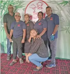  ?? Photo: Susana Hirst-Tuilau ?? Vimal Mani(left) with his family and staff members on September 23, 2020 at Treat Yourself Restaurant in Rakiraki Town.