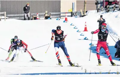  ?? PHOTO: LENNON BRIGHT/WINTER GAMES NZ ?? Home straight . . . Coming in strongly to take the gold medal for the men’s crosscount­ry skiing freestyle sprint is American Kevin Bolger (No 2).