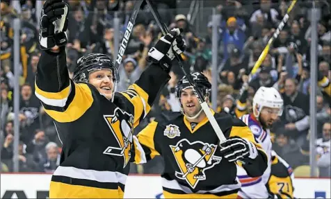  ?? Peter Diana/Post-Gazette ?? Jake Guentzel, left, has a goal and an assist in the past two games.