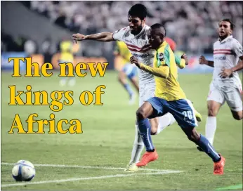  ?? PICTURE: EPA/KHALED ELFIQI ?? Zamalek’s Aly Gabr, left, hounds Sundowns’ Khama Billiat during the second leg of the Caf Champions League match at Borg al-Arab stadium in Alexandria, Egypt, last night.