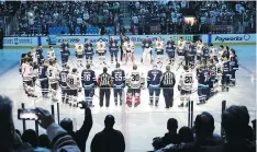  ?? JASON HALSTEAD/GETTY IMAGES ?? The Winnipeg Jets and Chicago Blackhawks honour those involved in the Humboldt Broncos bus crash tragedy.