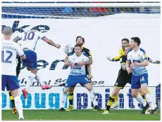  ??  ?? HEAD FIRST: James Norwood heads home No 3 for Tranmere