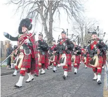  ??  ?? Inverness Royal British Legion pipe band last year.