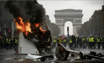  ?? (Photo AFP) ?? A Paris, la manifestat­ion a été émaillée d’incidents tout au long de la journée.