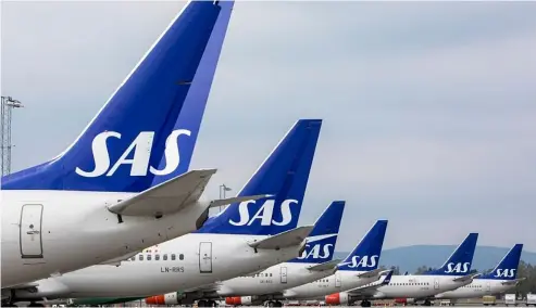  ?? ?? 4000 out of 75000 SAS flights are cancelled this summer. Ole Berg-Rusten/NTB Scanpix via AP