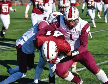  ?? / risportsph­oto.com ?? The No. 3 Woonsocket football team won its sixth straight game to advance to the Division II Super Bowl for the second straight season. The Novans held No. 1 East Greenwich to a season-low six points in Saturday’s semifinal.
