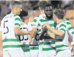  ??  ?? In command: Celtic celebrate James Forrest’s goal