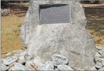  ??  ?? Rocks with names and ages mark the memorial for the SIEV X incident, in which 353 people drowned when their boat sank en route to Australia.