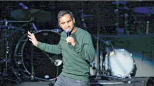  ?? Associated Press file photo ?? Comedian Aziz Ansari, shown during a performanc­e in Chicago in 2017, addresses the fallout from accusation­s of sexual assault in 2018 early in his new Netflix special, “Right Now.”