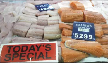  ?? ASSOCIATED PRESS ?? Fish is sold at a shopping center, on July 27, in Sydney, Australia.