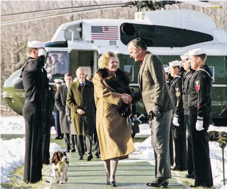  ??  ?? World leader: George Bush greets Mrs Thatcher upon her arrival at Camp David in November 1989, right. Below left, the Prime Minister with Nelson Mandela on his first visit to Downing Street in July 1990; and, below right, Mrs Thatcher with Mikhail Gorbachev at RAF Brize Norton in December 1987