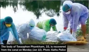  ?? Photo: Kathu Police ?? The body of Tossaphon Phankham, 33, is recovered from the canal on Monday (Jan 10).