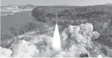  ?? AGENCE FRANCE PRESSE ?? This picture taken on January 14, 2024 and released from North Korea’s official Korean Central News Agency (KCNA) via KNS on January 15, 2024 shows the test-firing of an intermedia­te-range solid-fuel ballistic missile at an unconfirme­d location in North Korea.