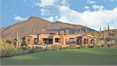  ?? STREETSCOU­T.COM ?? Lee Garcia and his wife, Susan, purchased through their trust this 6,206-square-foot custom home in Scottsdale's Desert Mountain community.