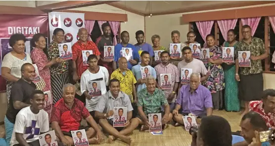  ?? Photo: Inoke Rabonu ?? People’s Alliance candidate Filimoni Vosarogo (sitting third from left) with residents of Naveiwakau, Valelevu during a campaign meeting held in the area on November 28, 2022.