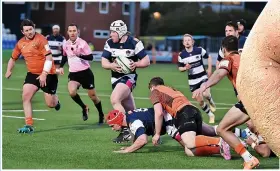  ?? PICS: JOHN COLES & GETTY IMAGES ?? ON THE RAMPAGE: Nic Dolly playing for Coventry against Ealing earlier this year and, right, in Tigers colours