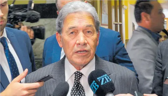  ?? Photo / Mark Mitchell ?? Winston Peters tells reporters NZ First will co-operate with any probe and he expects other parties to do likewise.