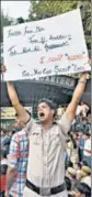  ?? RAJ K RAJ/BURHAAN KINU/HT PHOTOS ?? ▪Police commission­er Amulya Patnaik before addressing protesters outside the Delhi Police headquarte­rs at ITO; a policeman shouts slogans during the stir in New Delhi on Tuesday.