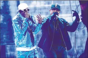  ?? Chris Pizzello The Associated Press ?? Flavor Flav, left, and Chuck D perform “Rebel Without a Pause” at the Grammy Awards on Sunday in Los Angeles.