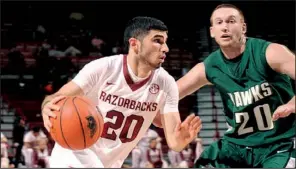  ?? NWA Media/ANDY SHUPE ?? Guard Kikko Haydar said the new hand-check rule will benefit Arkansas because of how the Razorbacks attack the basket. “It’s going to even itself out,” Haydar said.