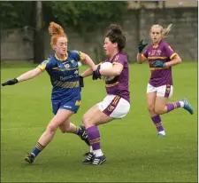  ??  ?? Wicklow’s Molly Cullen challenges Wexford’s Niamh Mernagh.