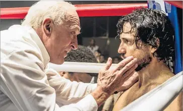  ?? Photograph­s by Rico Torres Weinstein Co. ?? SETTLING into the Burgess Meredith role establishe­d in “Rocky,” Robert De Niro portrays Ray Arcel coaching Panamanian champion Roberto Duran, played by Édgar Ramírez in the boxing biopic “Hands of Stone.”