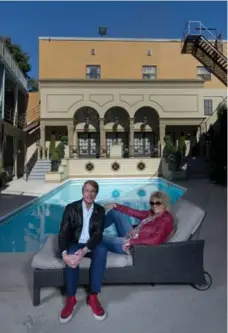  ??  ?? Degrassi executive producers Linda Schuyler and Stephen Stohn relax by the heated salt-water pool of Degrassi ’s Hollingswo­rth mansion.