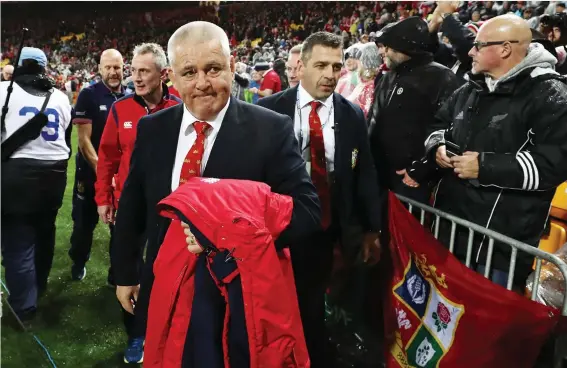  ?? PICTURE: Getty Images ?? Wry smile: Warren Gatland walks off after the Lions second Test win over the All Blacks