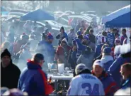  ?? BILL WIPPERT - FREELANCER, AP ?? Fans arrive to tailgate before an NFL football game between the Buffalo Bills and the Jacksonvil­le Jaguars in Orchard Park, N.Y., in this Sunday, Nov. 27, 2016, file photo.