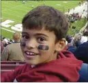  ?? SUBMITTED BY ZACH BUCKEY ?? Garces senior Zach Buckey poses at a Stanford football game as a 7-year-old. The Rams defensive lineman committed to play for the Cardinal this week.