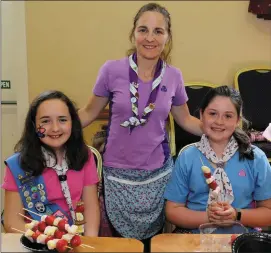  ??  ?? LEFT: Hannah Walsh and Eimear Murphy with Leader Mary O’ Connor at the Boherbue Girl Guides Old Time Tea Room fundraiser.