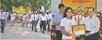  ??  ?? (L-R) Students at the walkathon organised to observe World Biofuel Day in the city. A student is awarded a memento at the World Biofuel Day celebratio­ns.