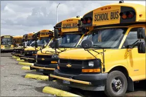  ?? IRIS SAMUELS — THE ASSOCIATED PRESS ?? School buses park Aug. 20 in Helena, Mont. ahead of the beginning of the school year.