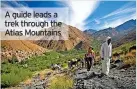  ?? ?? A guide leads a trek through the Atlas Mountains