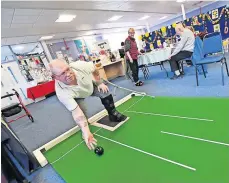  ?? ?? Bowled over Members of the carpet bowling club were delighted to see it return after covid restrictio­ns were lifted