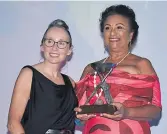  ?? Picture: REINAL CHAND ?? Fiji Hotel and Tourism Associatio­n chief executive officer Fantasha Lockington (right) received the Dixon Seeto Tourism Leader Award during the ANZ Fiji Excellence in Tourism Awards at the Sheraton Fiji Golf and Beach Resort in Denarau Nadi.