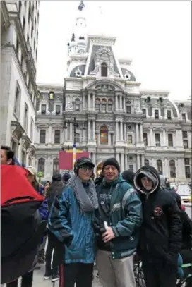  ?? SUBMITTED PHOTO ?? From left, Sam Nolan, 17, with his father, Chester Police Chief James Nolan IV, and cousin Mason Nolan, 13, stand near City Hall in Philadelph­ia during Thursday’s epic Super Bowl parade.