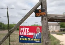  ?? AP FILES ?? A campaign sign for Pete Arredondo hangs in May on a fence in Uvalde, Texas.