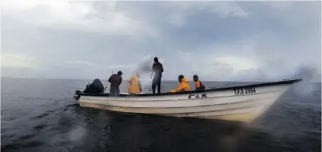  ?? PHOTOS: JAHI CHIKWENDIU/WASHINGTON POST ?? Fishermen navigate waters where others have been robbed and/or killed by Venezuelan pirates. Locals are fishing closer to shore, and sometimes at night, to avoid the risk of attacks that have ranged from glorified muggings to robberies of merchant vessels and attacks on private yachts.