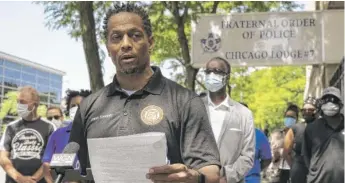  ??  ?? Shawn Kennedy, spokesman for the National Associatio­n of Black Law Enforcemen­t Officers, decries on Tuesday the “egregious actions” of Fraternal Order of Police President John Catanzara.
ASHLEE REZIN GARCIA/SUN-TIMES