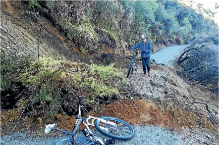  ?? BARRY HARCOURT ?? Heavy Rain over Thursday night caused damage to the newly opened Te Anau cycle Trail between Te Anau and Queens Reach.