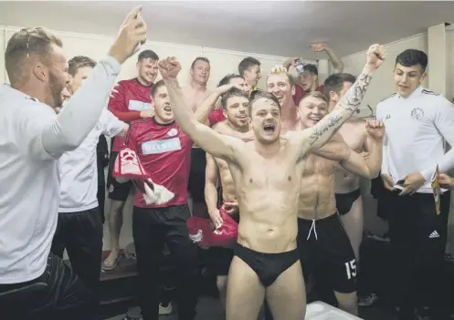  ?? PICTURE: ROSS PARKER/SNS ?? 0 Brechin City players celebrate winning promotion to the Championsh­ip after defeating Alloa on penalties.