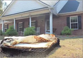  ?? Spencer Lahr/RN-T ?? A torched mattress rests on the front yard of 30 Brookvalle­y Court after what Rome-Floyd County Fire Department Battalion Chief Gene Proctor says is a "suspicious" fire that broke out around 3:30 a.m. Saturday, Oct. 15, 2016.