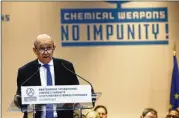  ?? THIBAULT CAMUS / ASSOCIATED PRESS ?? French Foreign Affairs Minister Jean-Yves Le Drian speaks in Paris on Tuesday to a partnershi­p against chemical weapons use. Le Drian is urging Turkey to show restraint in its fighting in Syria.