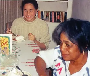  ??  ?? A slice of happy family life: Sitting next to Jeanette, 12-year-old Meghan tucks into a cake at her cousin Donovan’s birthday party in 1993