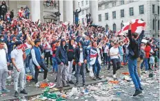  ?? AP ?? England supporters gather near Trafalgar Square in London during their team’s game against Italy on Sunday.